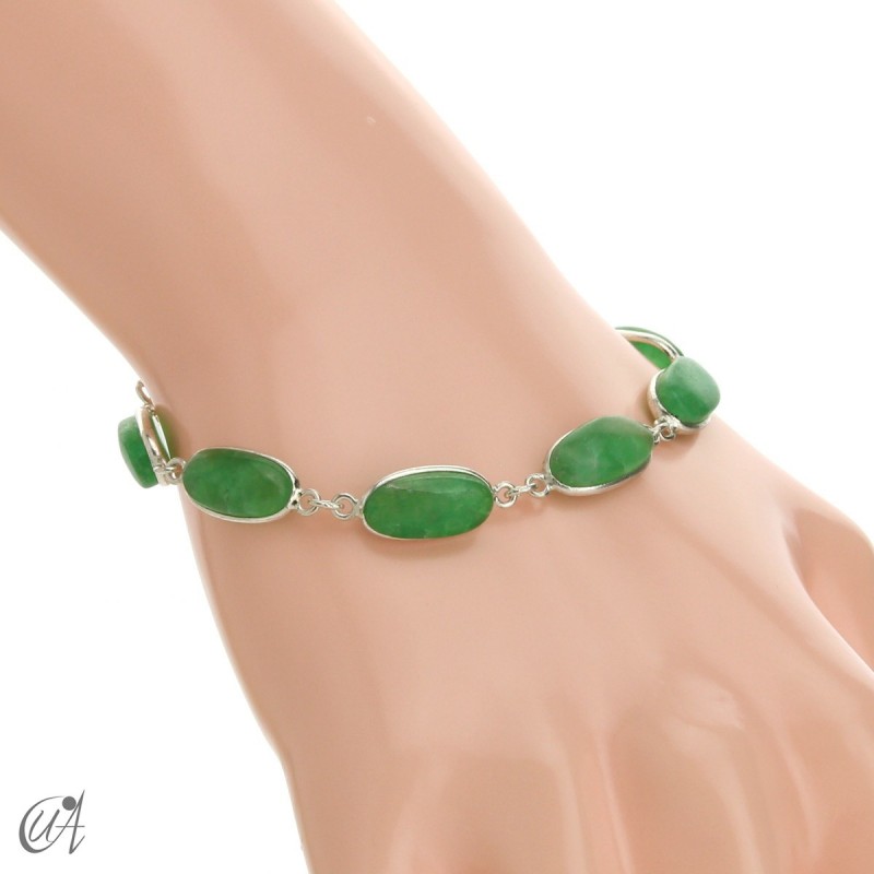 Oval bracelet, sterling silver with green sapphire