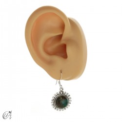 Matahari earrings (size ratio to an adult ear)