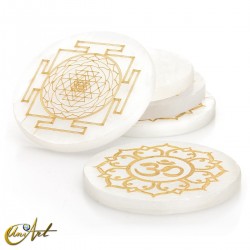 Selenite disc with Buddhist symbol