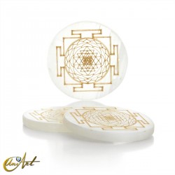 Selenite disc with Buddhist Mandala symbol