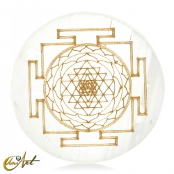 Disco de selenita con símbolo budista Mándala tibetano