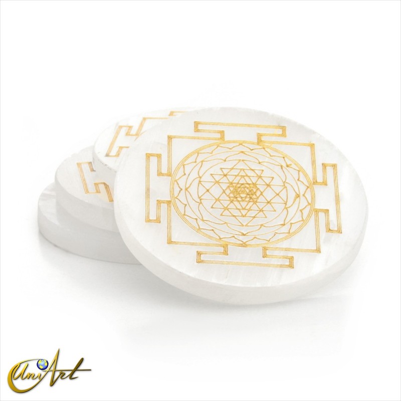 Selenite disc with Buddhist Mandala symbol