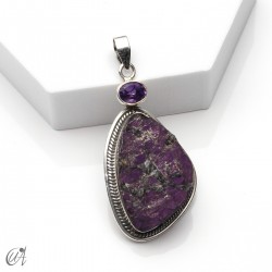 Silver pendant with rough purpurite and faceted gemstone