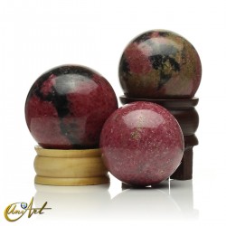 Natural rhodonite sphere