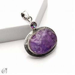 Rough amethyst with faceted gemstone in 925 silver pendant