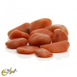 200 gramos de cantos rodados de calcita naranja, medianos