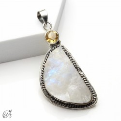 Rough moonstone with faceted gemstone, silver pendent