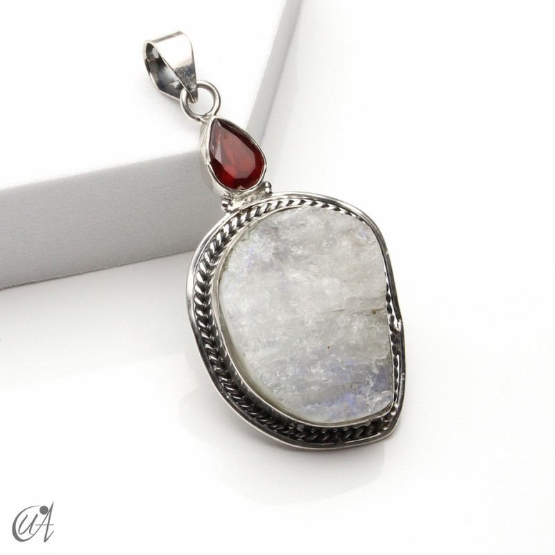 Rough moonstone with faceted garnet, silver pendant - model 1
