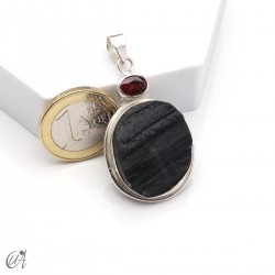 Rough black tourmaline pendant with garnet in sterling silver, model 2