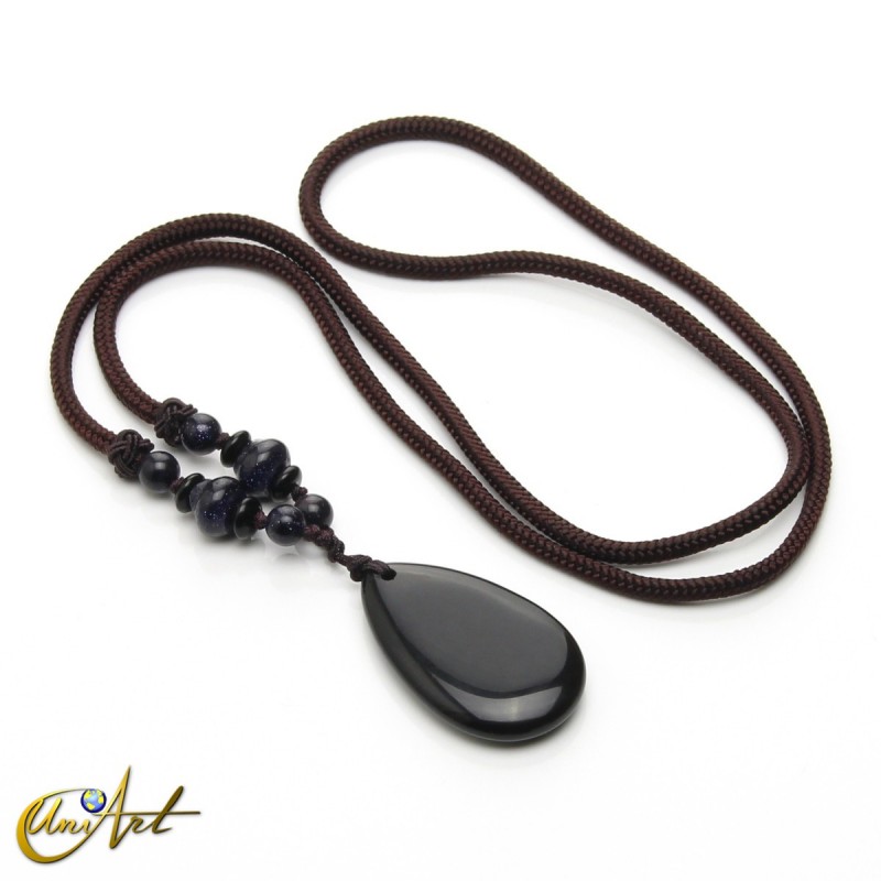 Collar con lágrima de ágata negra y piedra oro azul