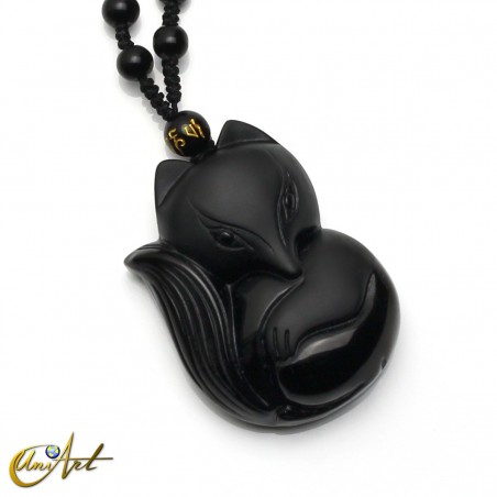 Carved obsidian fox with necklace