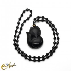 Carved obsidian fox with necklace