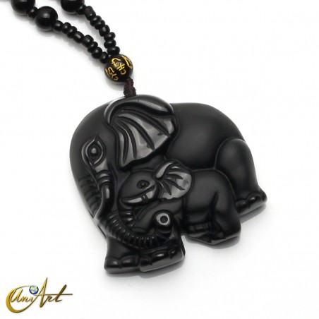 Carved obsidian elephants with necklace
