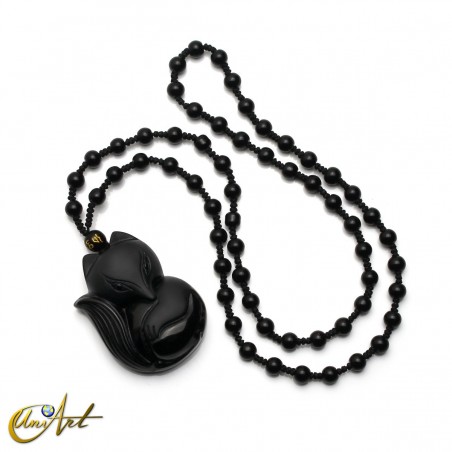 Carved obsidian fox with necklace